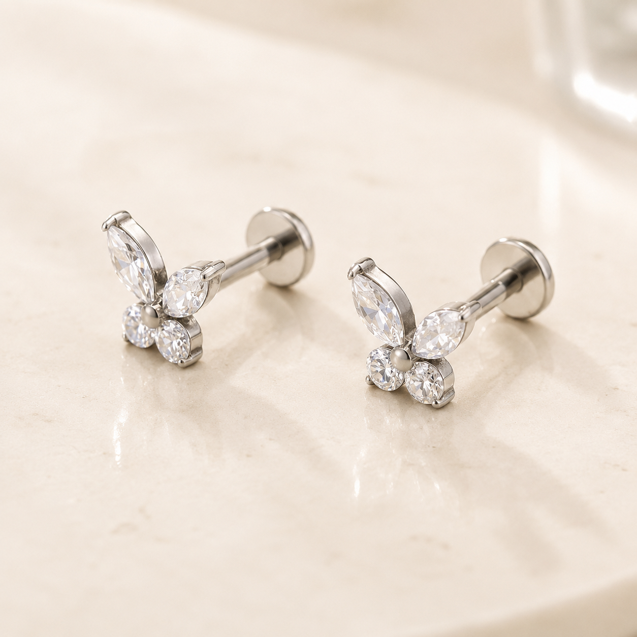F136 Titanium CZ Butterfly Flat Back Stud