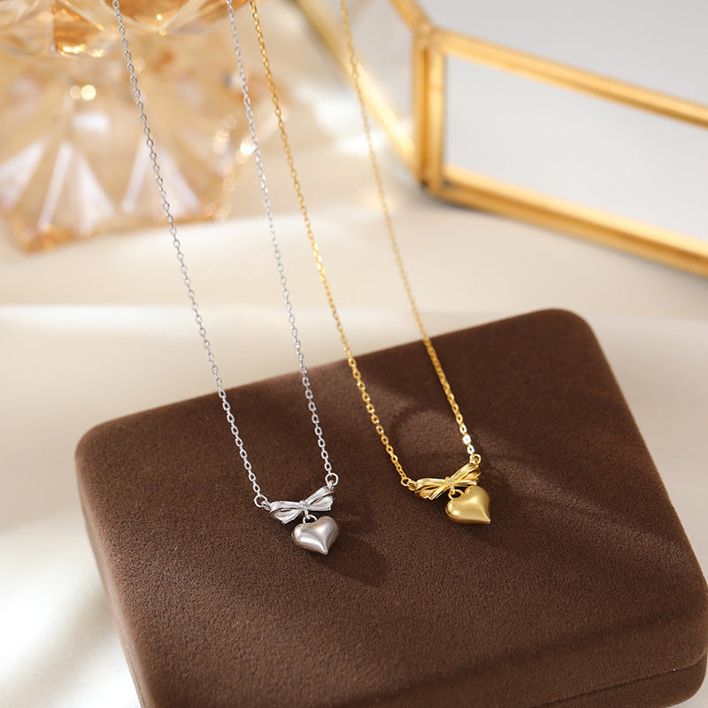 Sterling Silver Bow & Puffy Heart Pendant Necklace