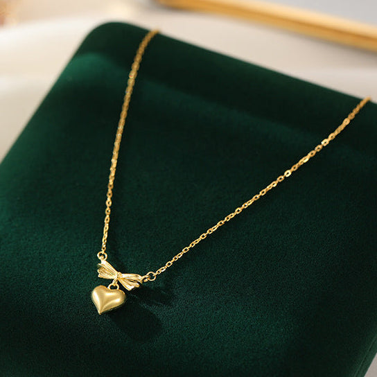 Sterling Silver Bow & Puffy Heart Pendant Necklace